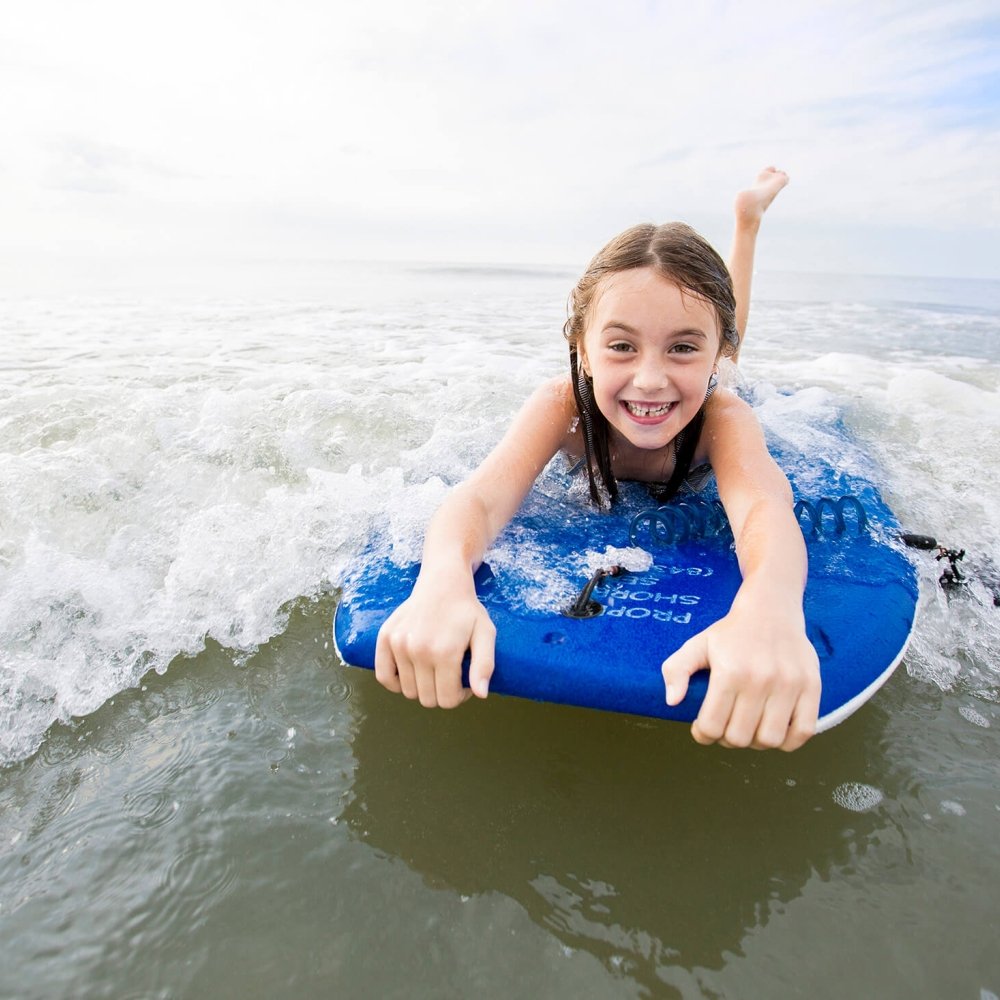 Child on a bogey board 